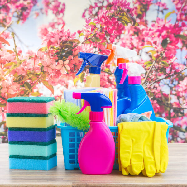 Spring Cleaning Concept - Colorful Sprays Bottles And Rubbers On
