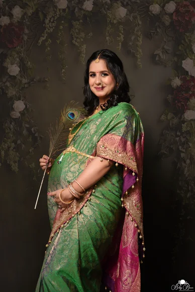 Elegant Maternity Photoshoot in Saree: Celebrate Your Pregnancy in Style 3 maternity photoshoot in saree